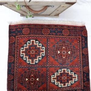 Semi antique Baluch rug from Iran. 64x61 cms