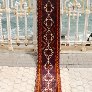 Vintage Baluch rug from Afghanistan. 252x33 cms