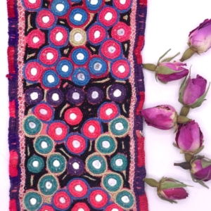 Vintage Gujarati textile from India. 15x8 cms