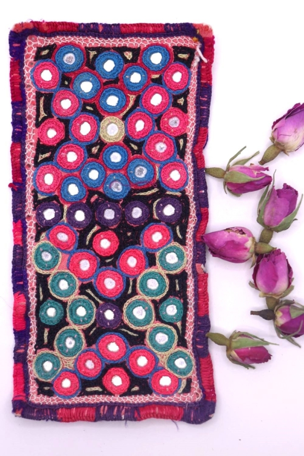 Vintage Gujarati textile from India. 15x8 cms
