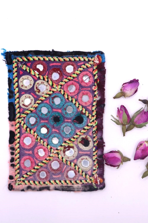 Vintage Gujarati textile from India. 13x9 cms